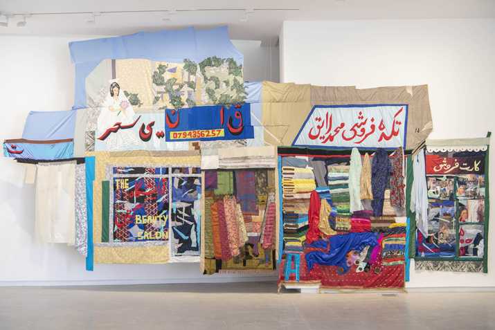 Hangama Amiri Bazaar, 2020 Cotton, chiffon, muslin, silk, suede, digitally woven textile, camouflage fabric, sari textile, inkjet prints on paper and canvas, paper, plastic, acrylic paint, marker, polyester, table cloth, faux leather, and found fabric 426.72 x 792.48 cm, Courtesy of the artist and T293 Gallery, Rome