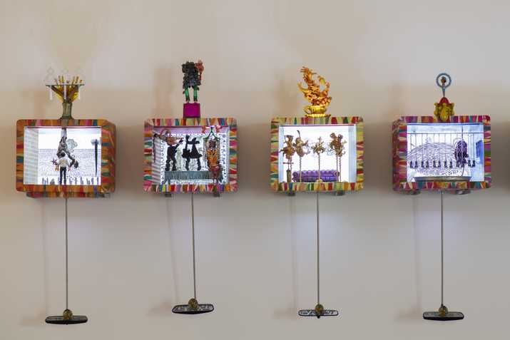 Anant Joshi, Happy New Year 2013, Fibreglass box, acrylic, mirror, steel, resin, industrial paint, kite paper, LED lights, ready made objects Dimensions variable; each box 38.1 × 48.26 × 45.72 cm, Collection of Kiran Nadar Museum of Art, New Delhi Courtesy of the artist